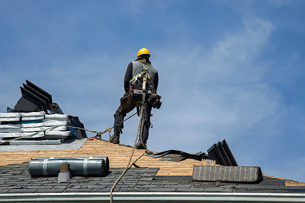 Professional Roof Replacement technician working in Oakfield, WI